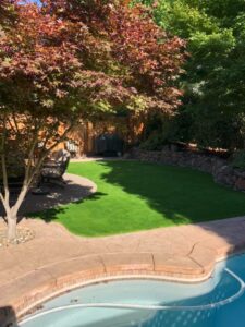 A quality landscape includes artificial grass when needed.